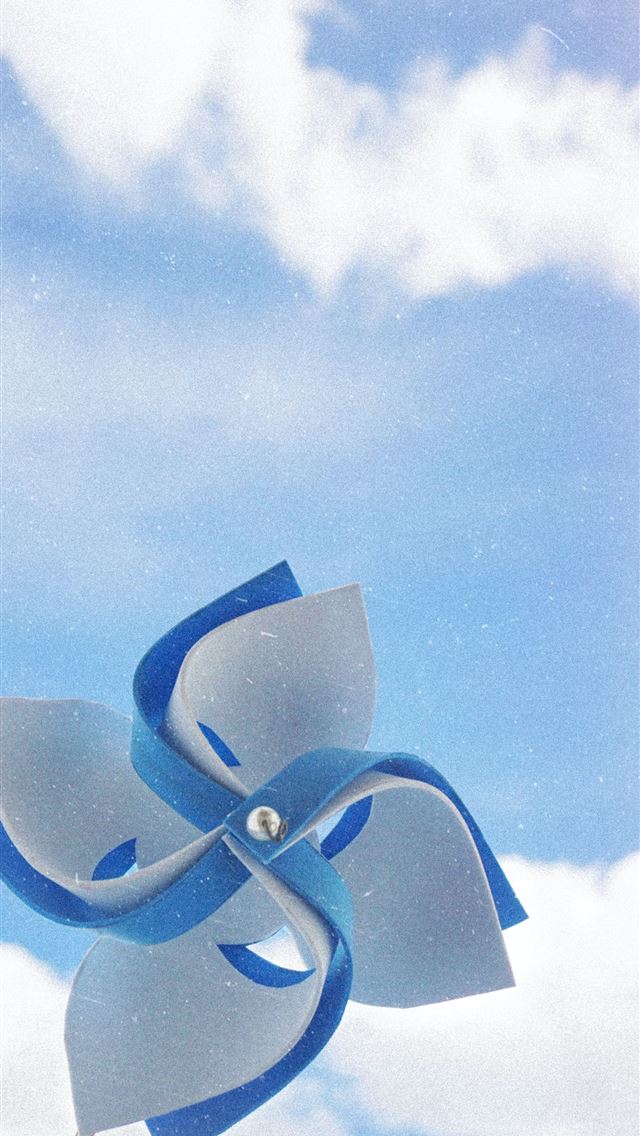 1290x2796 white and blue handheld windmill under cloudy skie... - summer iPhone Wallpaper