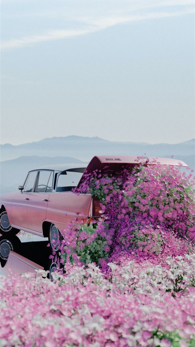 1290x2796 a pink car parked in a field of flowers -  iphone 14 Wallpaper