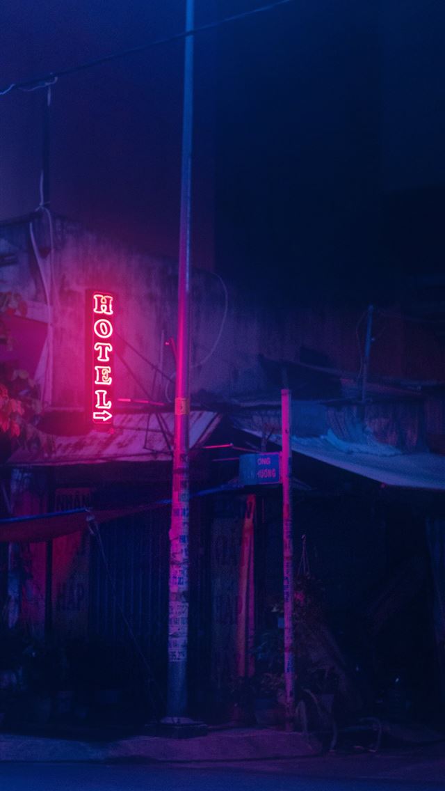 1290x2796 a red neon sign on the side of a building - house iPhone Wallpaper