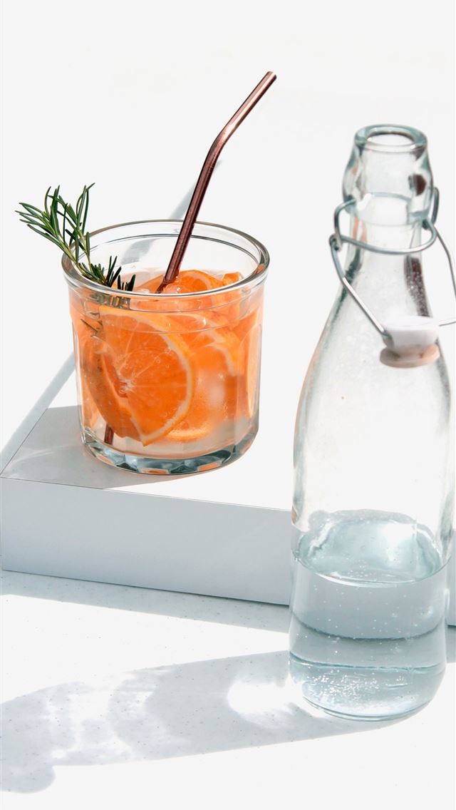 1290x2796 clear glass bottle beside orange juice in clear gl... - food iPhone Wallpaper
