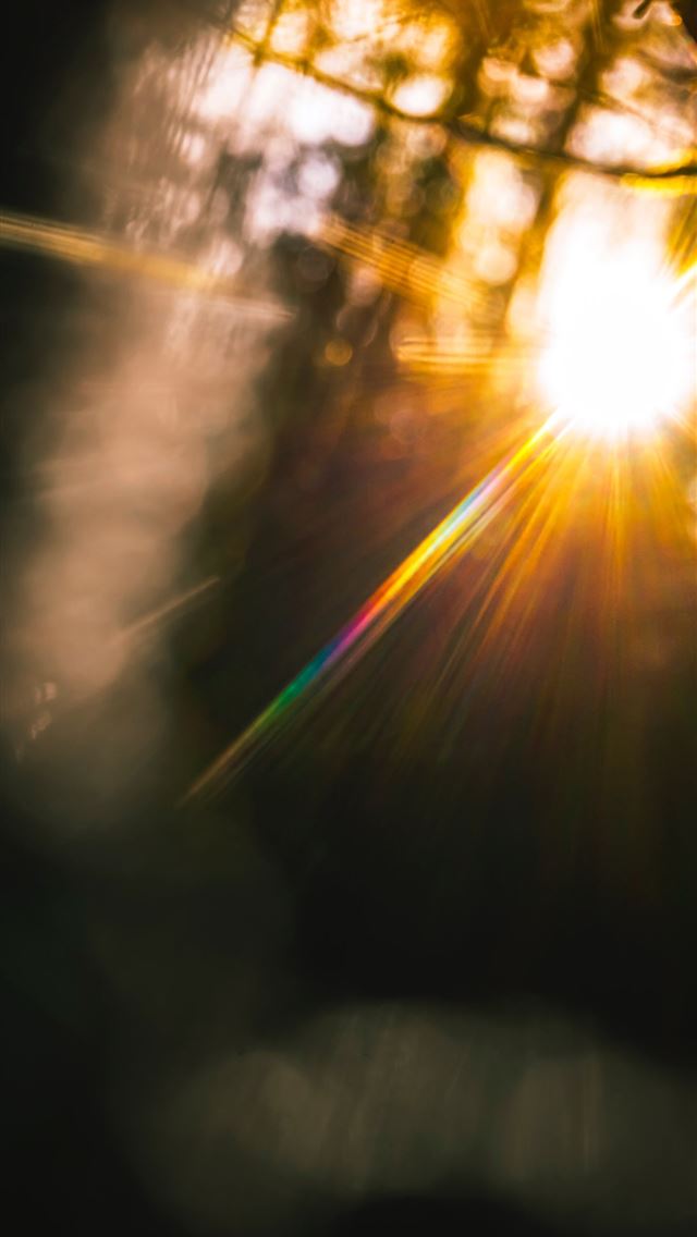 1290x2796 sun light on a dark room - fire iPhone Wallpaper