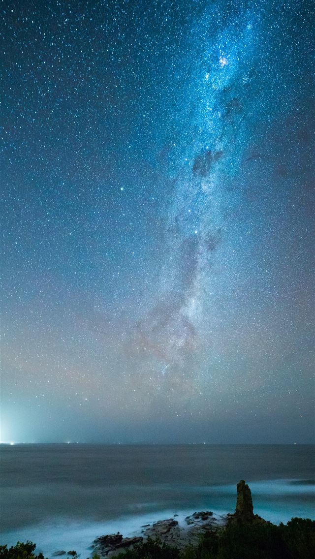 1290x2796 person standing on beach under starry night - nebula iPhone Wallpaper