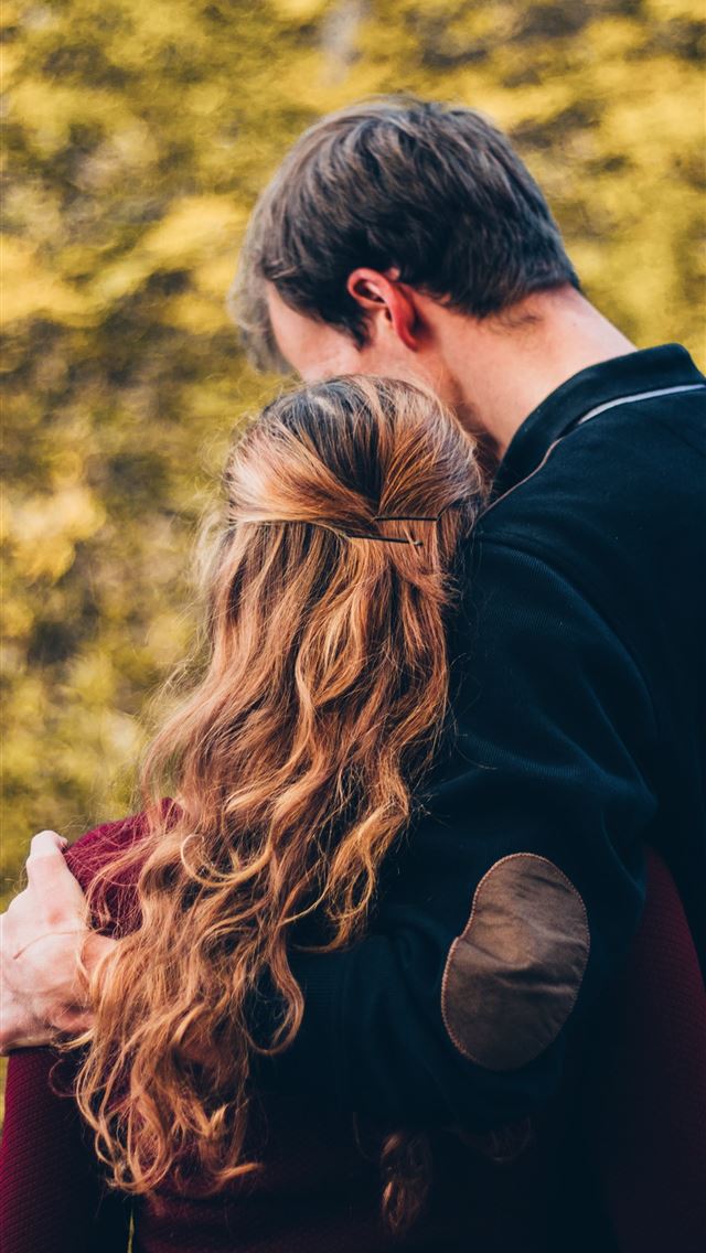 1290x2796 woman and man standing beside tree at daytime - girl iPhone Wallpaper