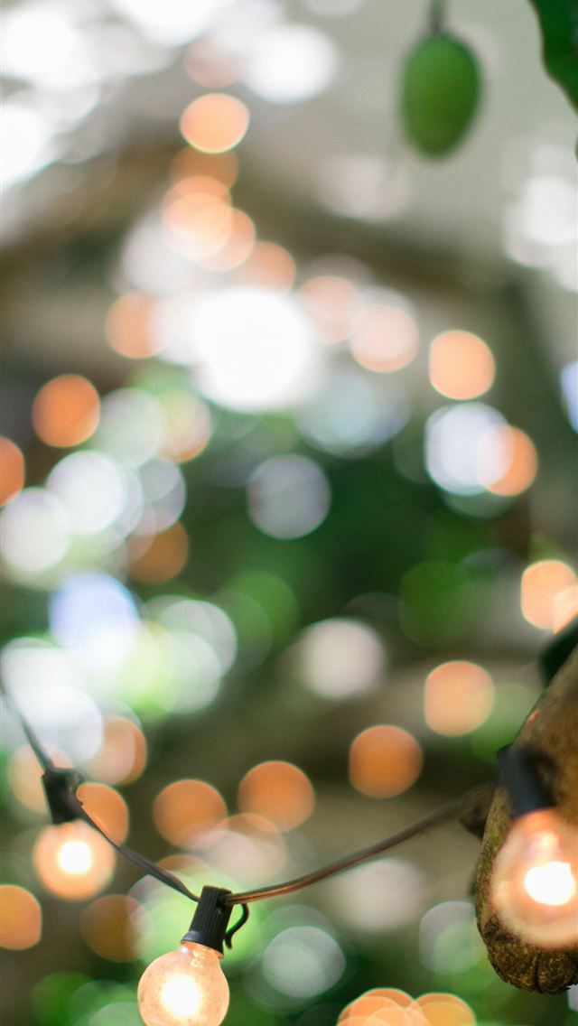 1290x2796 tilt shift lens photography of LED bulb - bokeh iPhone Wallpaper
