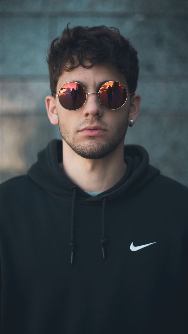 1290x2796 man standing wearing black Nike hoodie - cool iPhone Wallpaper