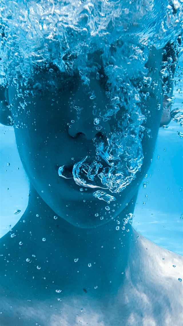 640x1136 person in water during daytime -  iPhone Wallpaper