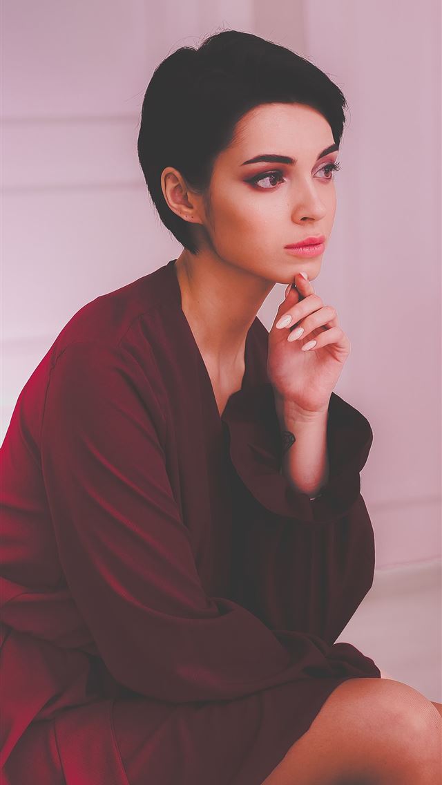 1290x2796 woman sitting on chair with her hand on chin - beauty iPhone Wallpaper