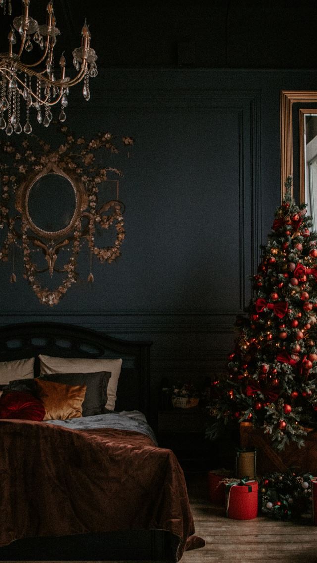 1290x2796 red and white bed linen near green christmas tree - holiday iPhone Wallpaper