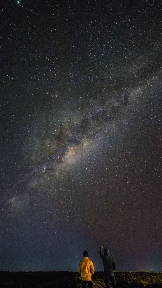 1290x2796 two person standing while watching sky - yellow iPhone Wallpaper