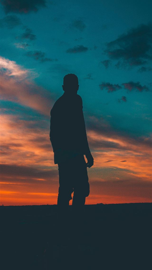 1290x2796 silhouette on man standing on ground -  iphone 15 Wallpaper