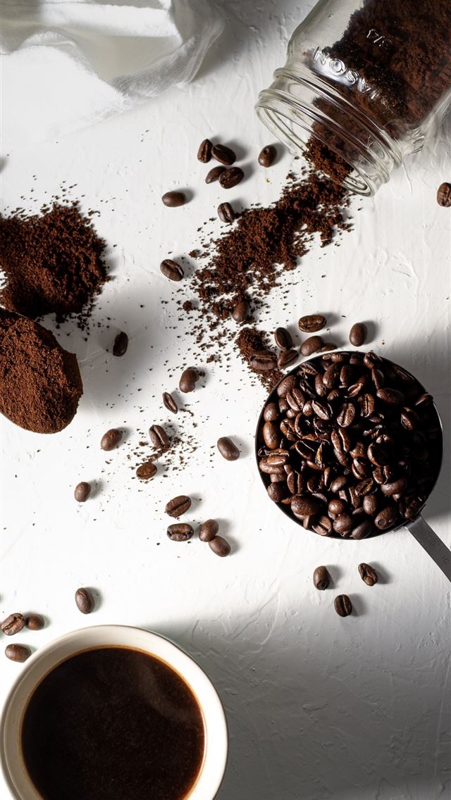 1290x2796 coffee beans on white ceramic mug beside stainless... -  iphone 15 Wallpaper