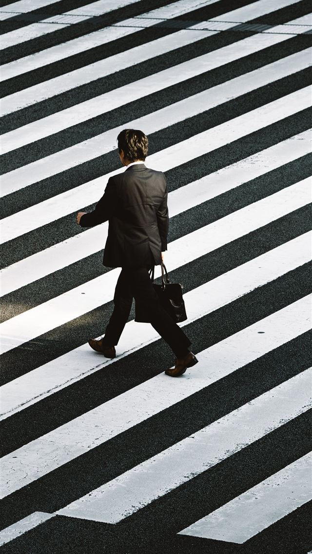 1290x2796 man in black formal suit jacket and pants carrying... - simple iPhone Wallpaper