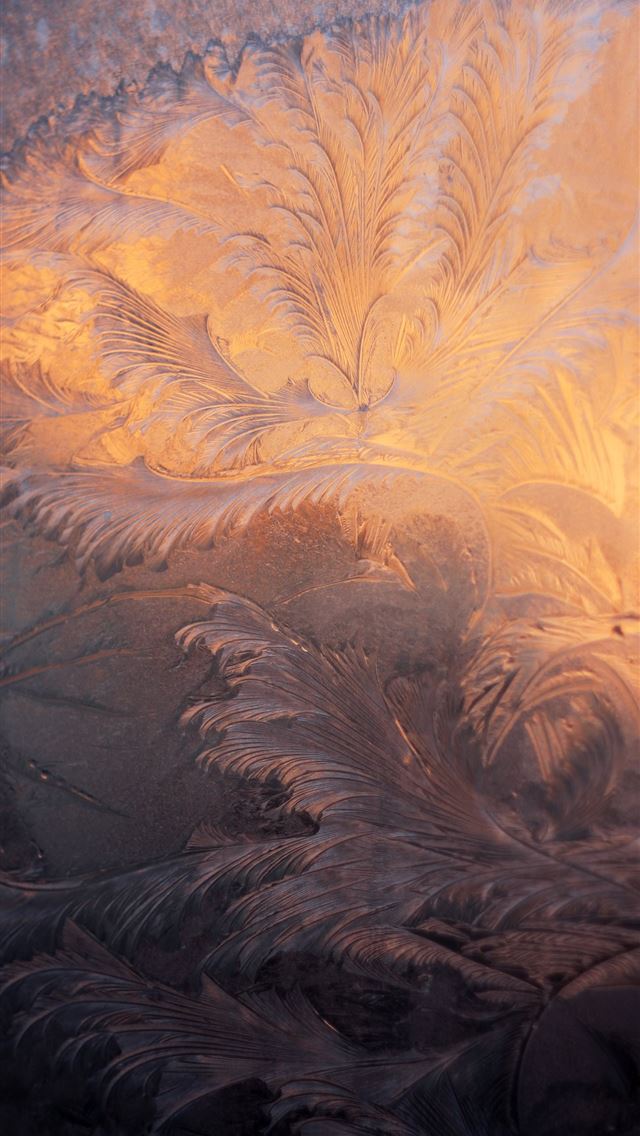 1290x2796 a close up of a frosted window with a sky in the b... -  iphone 15 Wallpaper