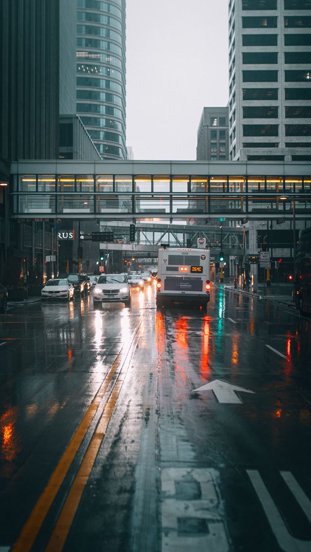1290x2796 cars on road near buildings -  iphone 15 Wallpaper