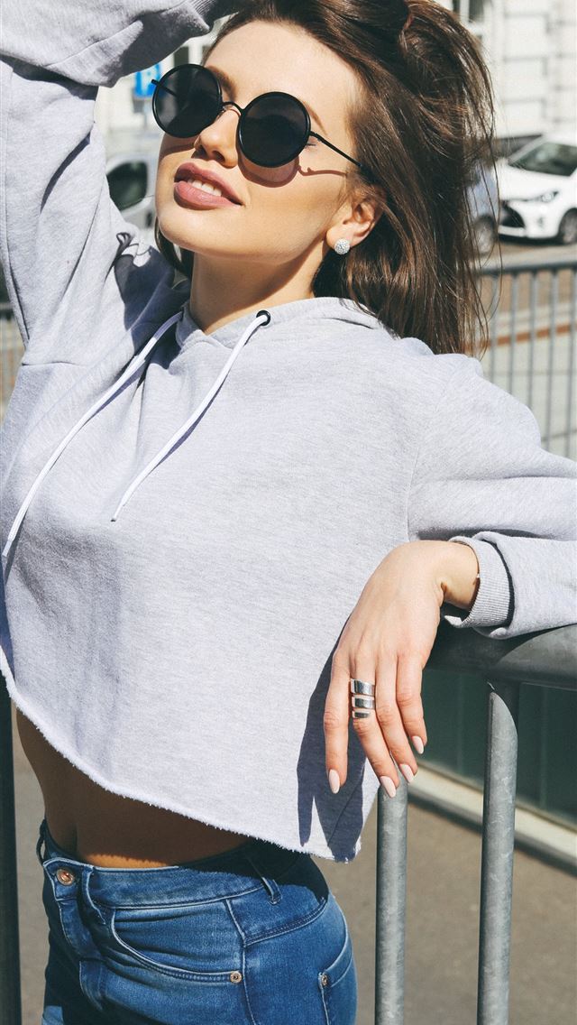 1290x2796 woman leaning on stair fence while holding hair - girl iPhone Wallpaper