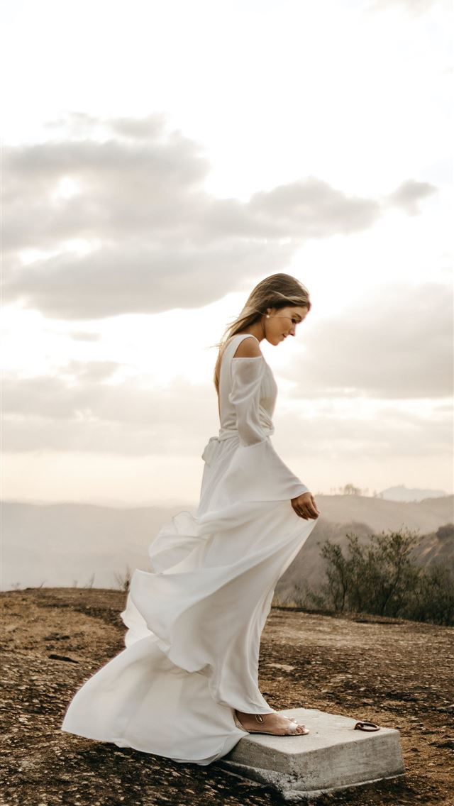 1290x2796 woman in white long sleeved dress -  iphone 15 Wallpaper