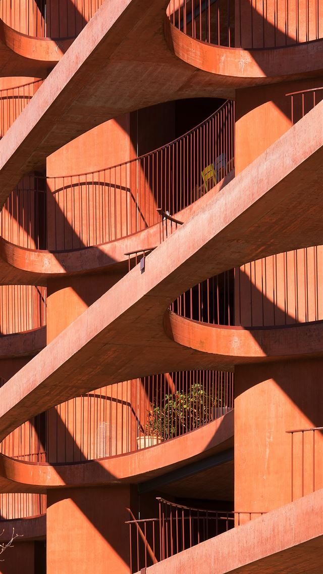 1290x2796 brown paint concrete building - circle iPhone Wallpaper