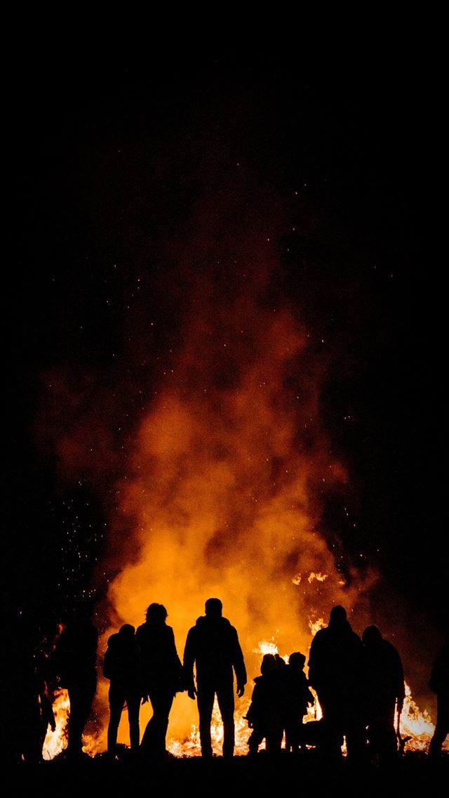 1290x2796 bonfire surrounded by people - dark (black) iPhone Wallpaper