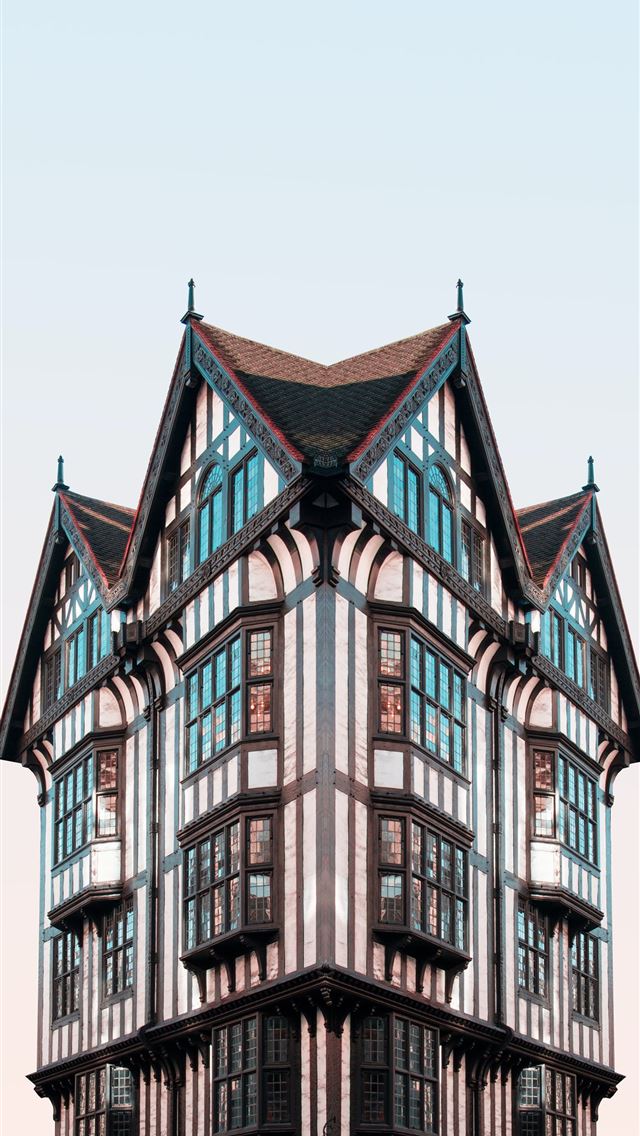 1290x2796 brown and white concrete building - window iPhone Wallpaper