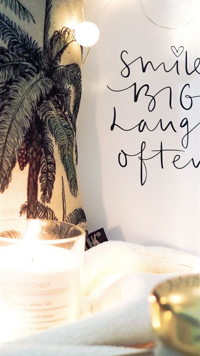 1290x2796 a candle sitting on top of a table next to a sign - quotes iPhone Wallpaper