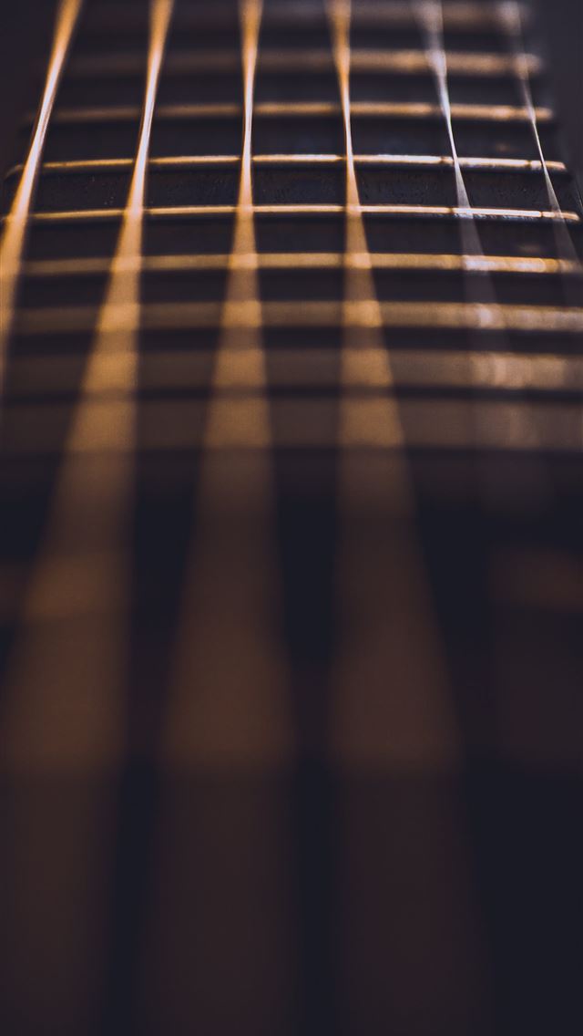 1290x2796 close up photo of guitar strings - music iPhone Wallpaper