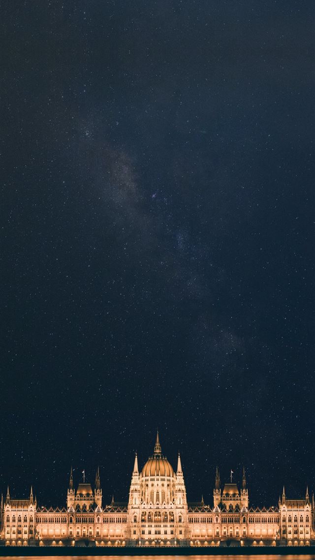 1290x2796 white concrete structure beside body of water - space iPhone Wallpaper