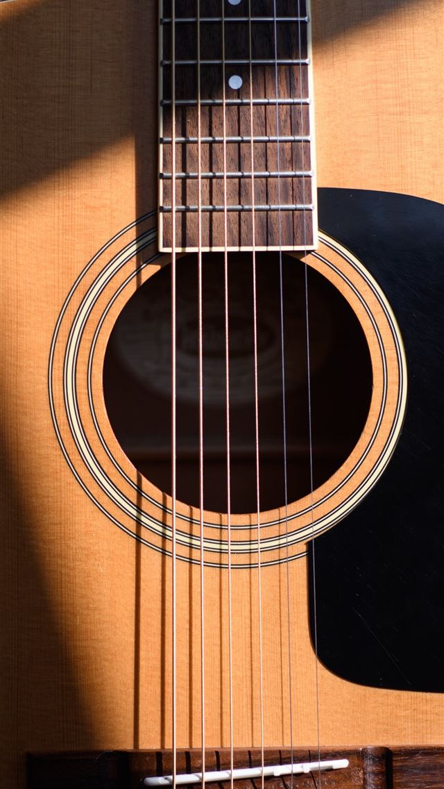 1290x2796 photo of brown gutiar fret - music iPhone Wallpaper