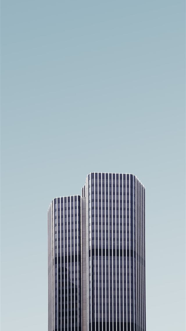 1290x2796 grey and white high rise building under white clou... - sky iPhone Wallpaper