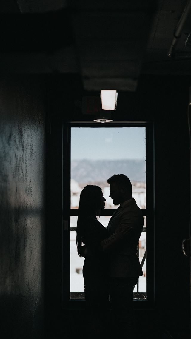 1290x2796 silhouette of couple inside dark room -  iphone 15 Wallpaper