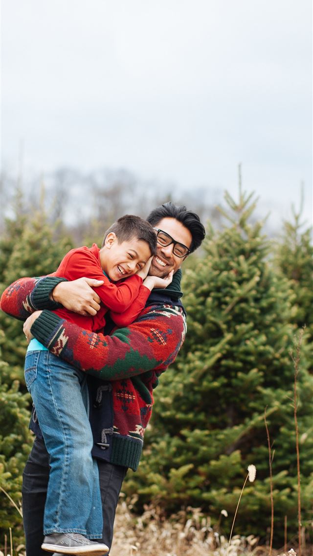 1290x2796 man carrying boy while standing and smiling near p... -  iphone 15 Wallpaper