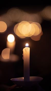 lit candle wallpaper