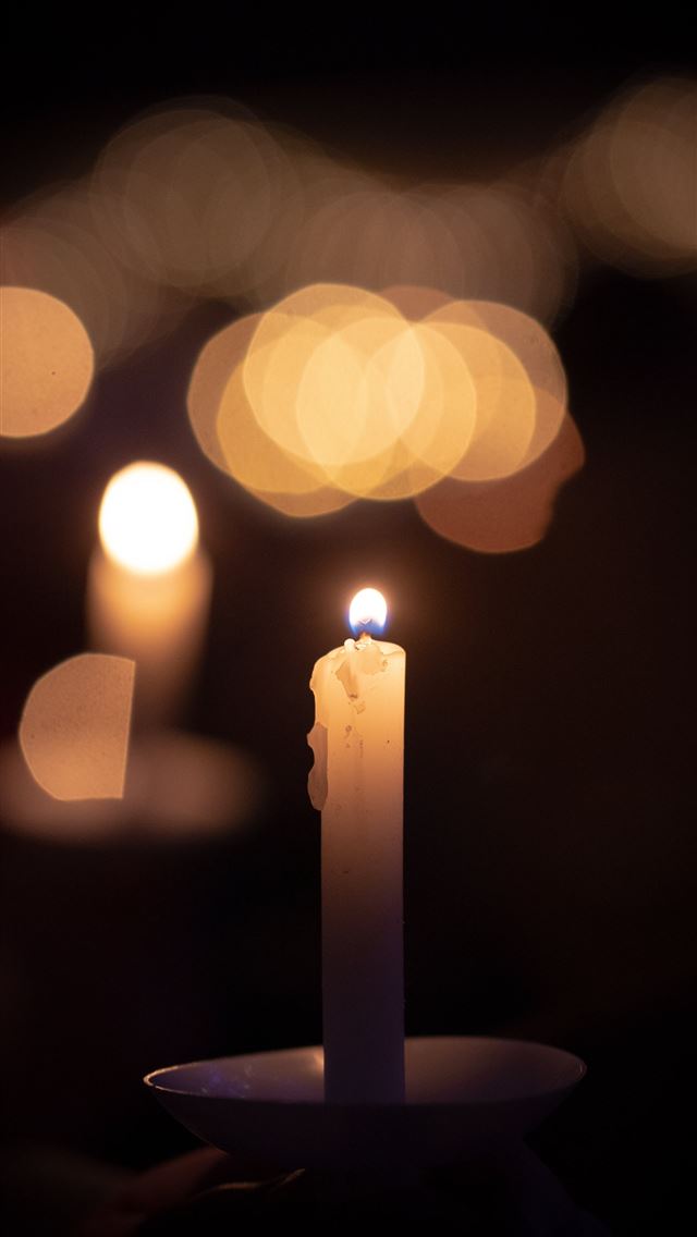 1290x2796 lit candle - baby iPhone Wallpaper