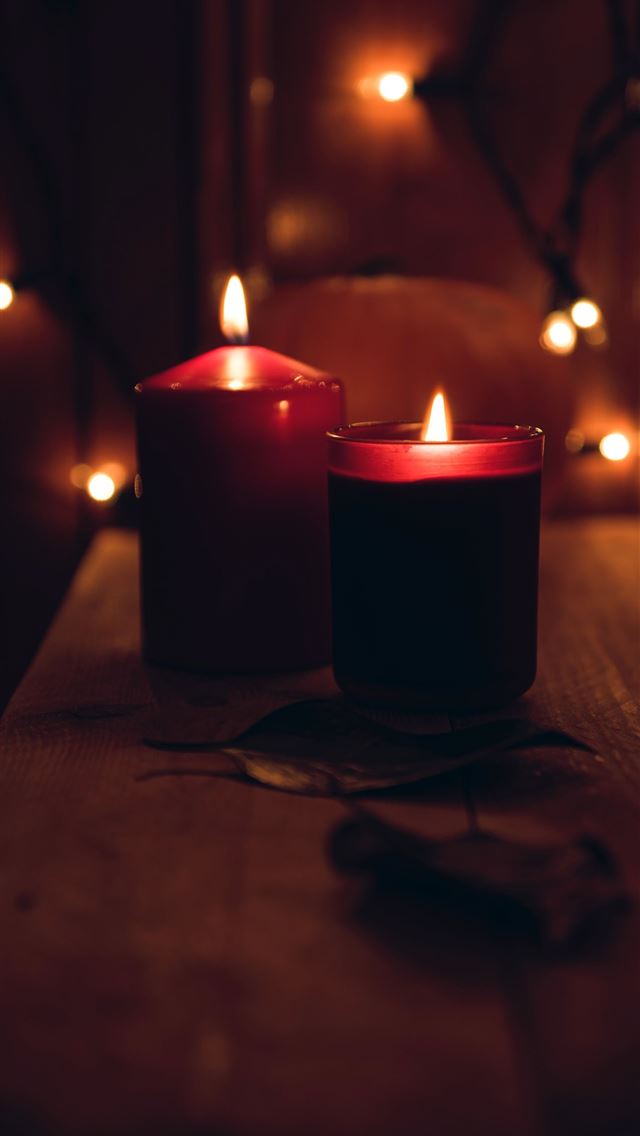 1290x2796 macro shot photography of two votive candles - holiday iPhone Wallpaper
