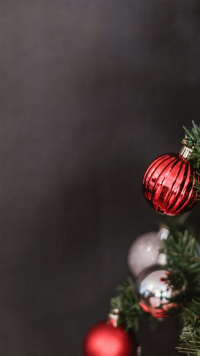 1290x2796 red and silver ornaments on holiday tree - holiday iPhone Wallpaper