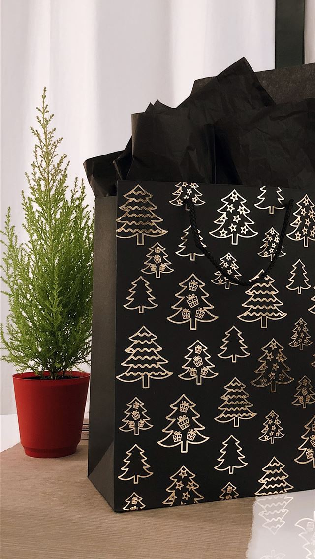 1290x2796 black and gray paper bag on table - holidays iPhone Wallpaper