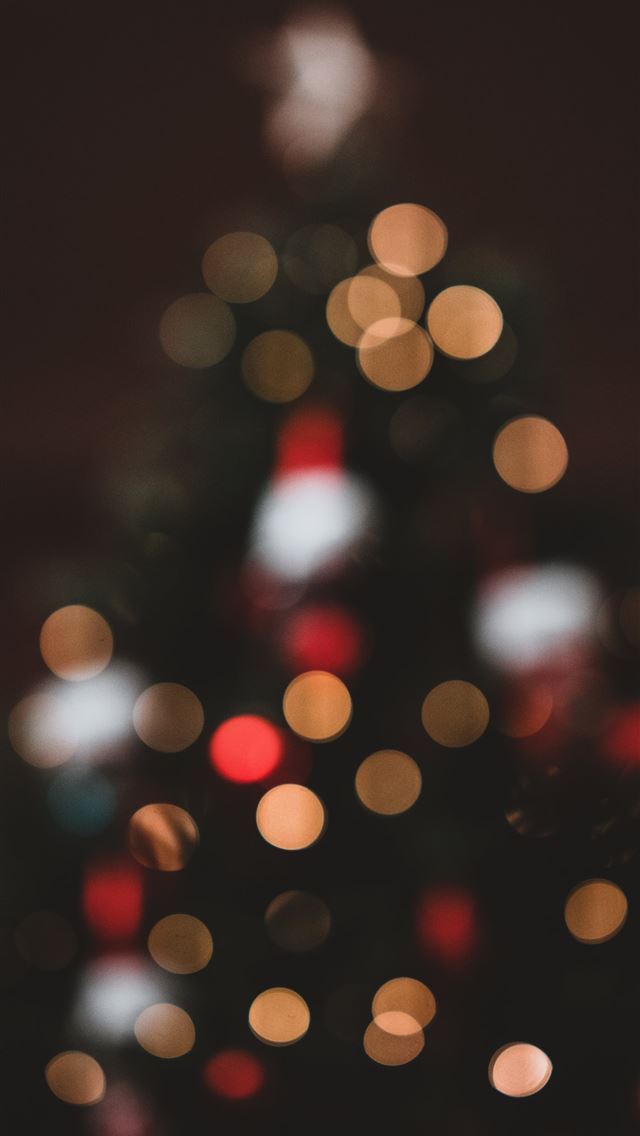 1290x2796 bokeh photography of Christmas tree with lights - abstract iPhone Wallpaper