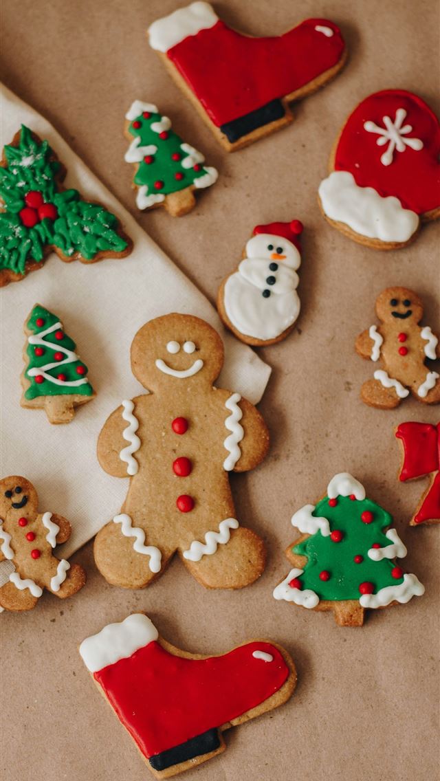 1290x2796 a table topped with lots of decorated cookies - cake iPhone Wallpaper