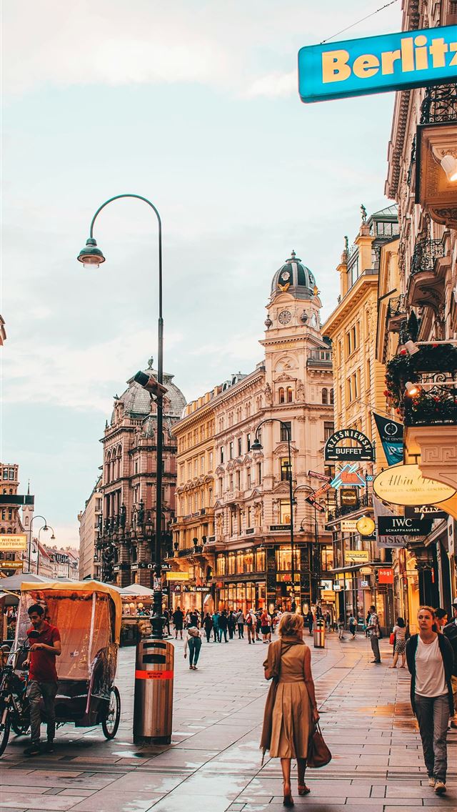 1290x2796 people walking beside Berlitz building during dayt... - christmas iPhone Wallpaper
