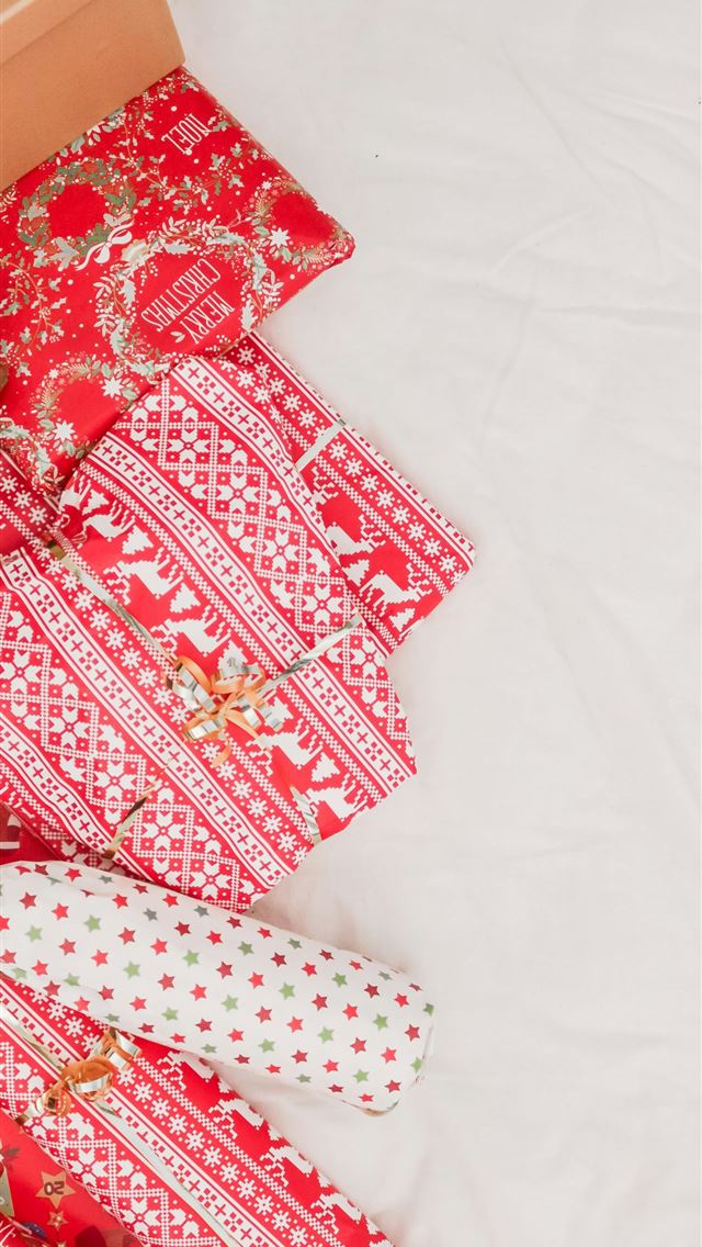 1290x2796 Christmas gifts on bed - girl iPhone Wallpaper