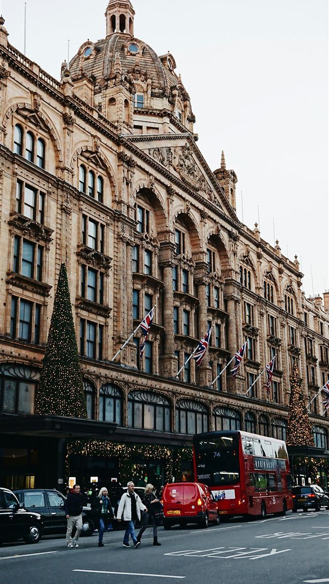 1290x2796 cars on park near brown building -  iphone 15 Wallpaper