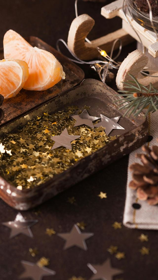 1290x2796 two sliced citrus fruits on brow tray beside pinec... - holiday iPhone Wallpaper
