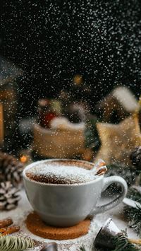 a cup of hot chocolate on a table wallpaper
