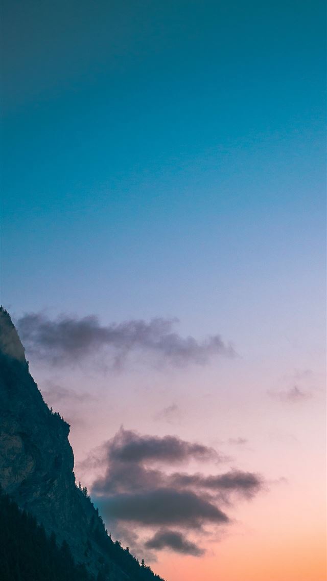 640x1136 a mountain with a few clouds in the sky -  iPhone Wallpaper