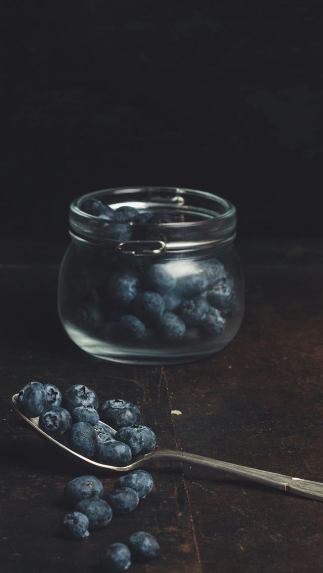 1290x2796 spoonful of blueberries from glass jar - fruit iPhone Wallpaper