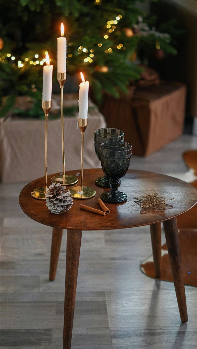 1290x2796 white candles on black ceramic candle holder on br... - wood iPhone Wallpaper