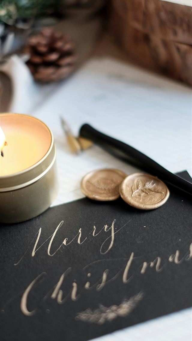 1290x2796 shallow focus photo of lighted white votive candle - christmas iPhone Wallpaper