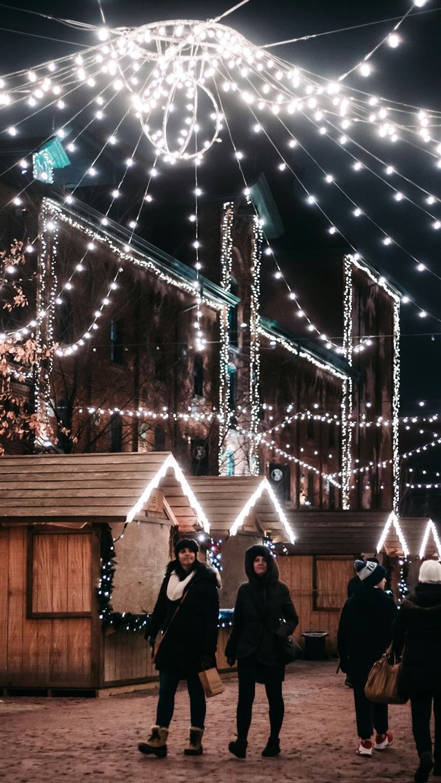 1290x2796 people standing near lights -  iphone 15 Wallpaper