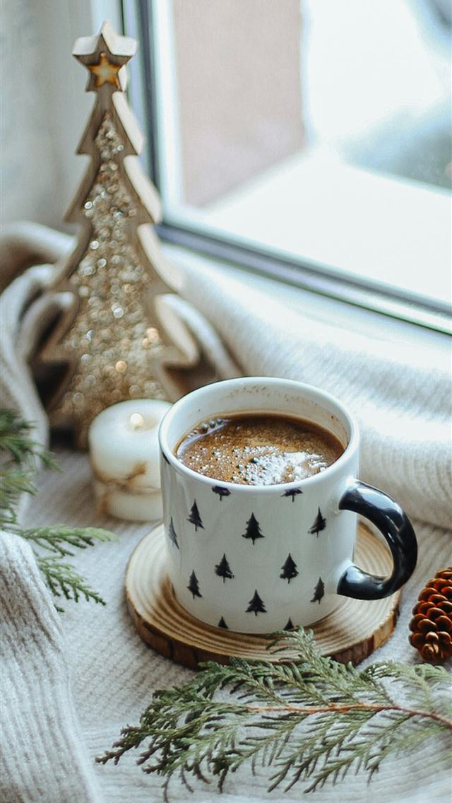 1290x2796 a cup of coffee sitting on top of a wooden plate - grey iPhone Wallpaper