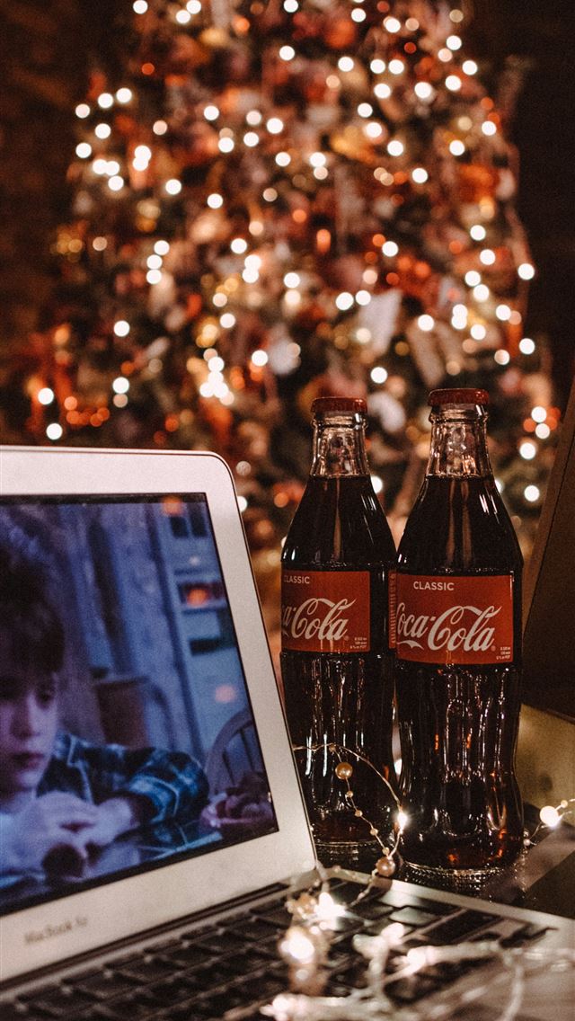 1290x2796 coca cola bottle beside white ipad -  iphone 15 Wallpaper