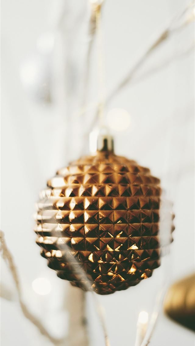 1290x2796 hanging gold colored bauble -  iphone 15 Wallpaper